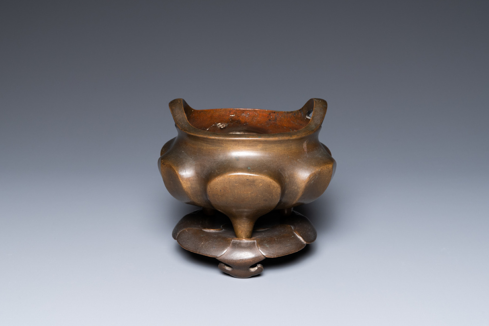 A Chinese bronze censer on lotus stand, Xuande mark, 19th C.