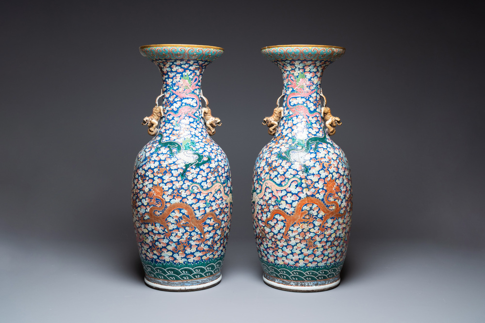 A pair of large Chinese famille rose 'dragon' vases, 19th C.
