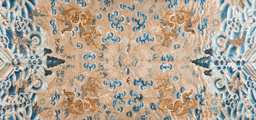 A large rectangular Chinese gold thread-embroidered silk panel decorated with four four-clawed dragons, Qing