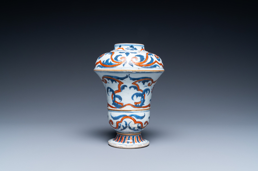 A Chinese blue, white and iron-red urn-shaped vase, Kangxi
