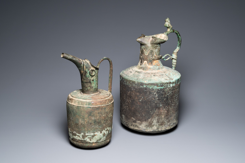 Two large Persian bronze ewers, Khorasan, Iran, 13/15th C.