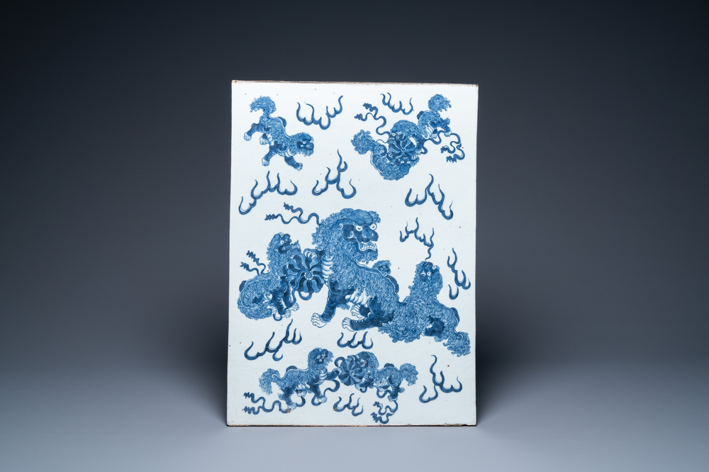 A large Chinese blue and white 'Buddhist lions' plaque, 19th C.