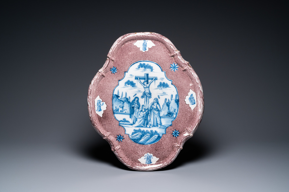 An exceptionally large Dutch Delft blue, white and manganese 'Golgotha' plaque, 18th C.
