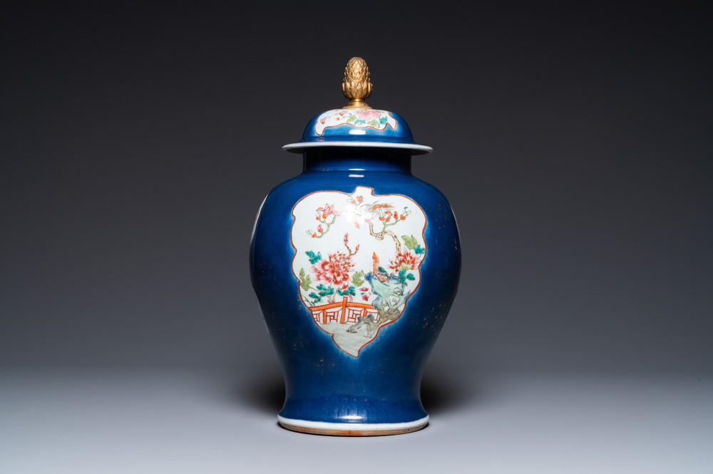 A Chinese famille rose blue-ground vase and cover, Qianlong