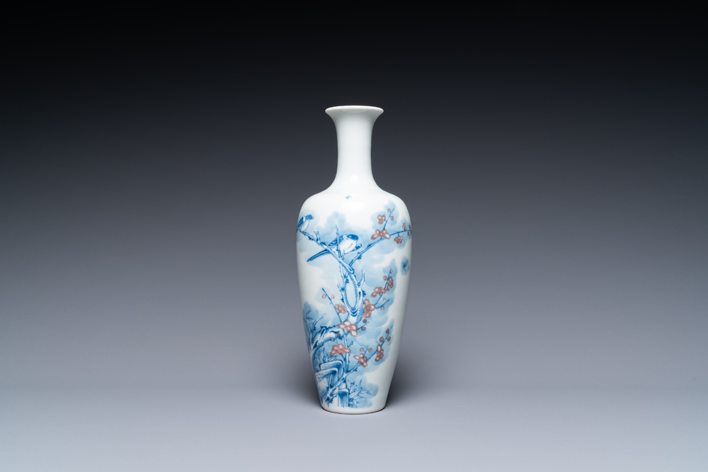 A Chinese blue, white and copper-red 'magpie and prunus' vase, Kangxi mark, 19/20th C.