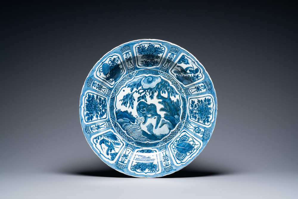 A very large Chinese blue and white kraak porcelain dish with a mythical beast, Wanli