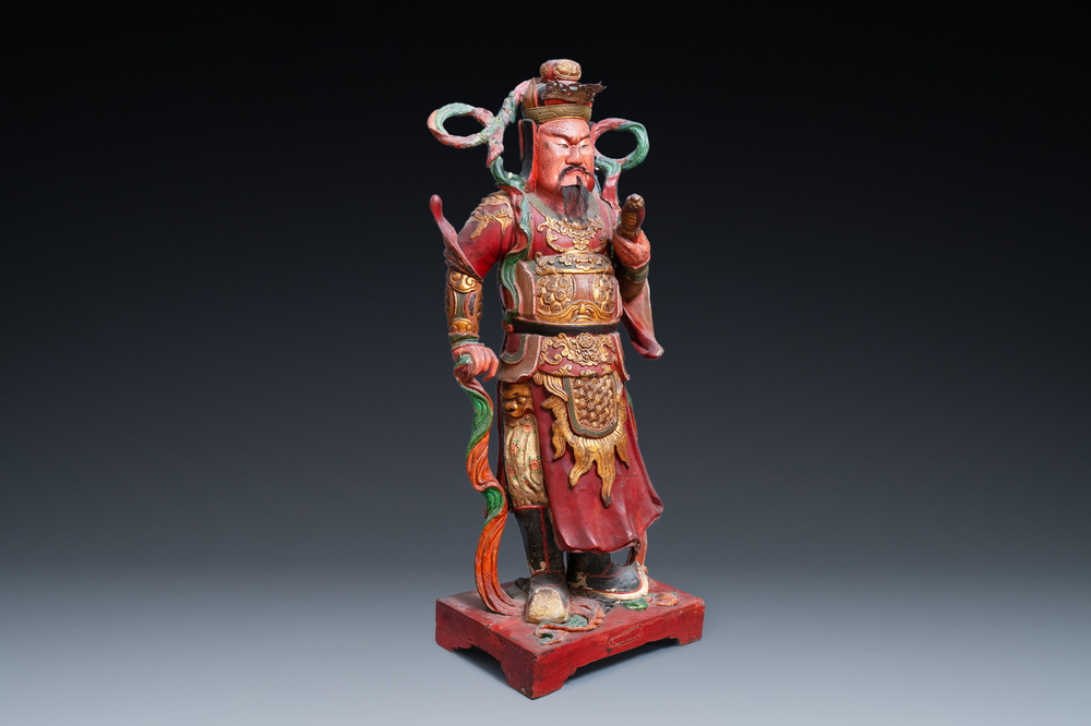 A large polychromed wooden figure of a guardian, China or Vietnam, 19th C.