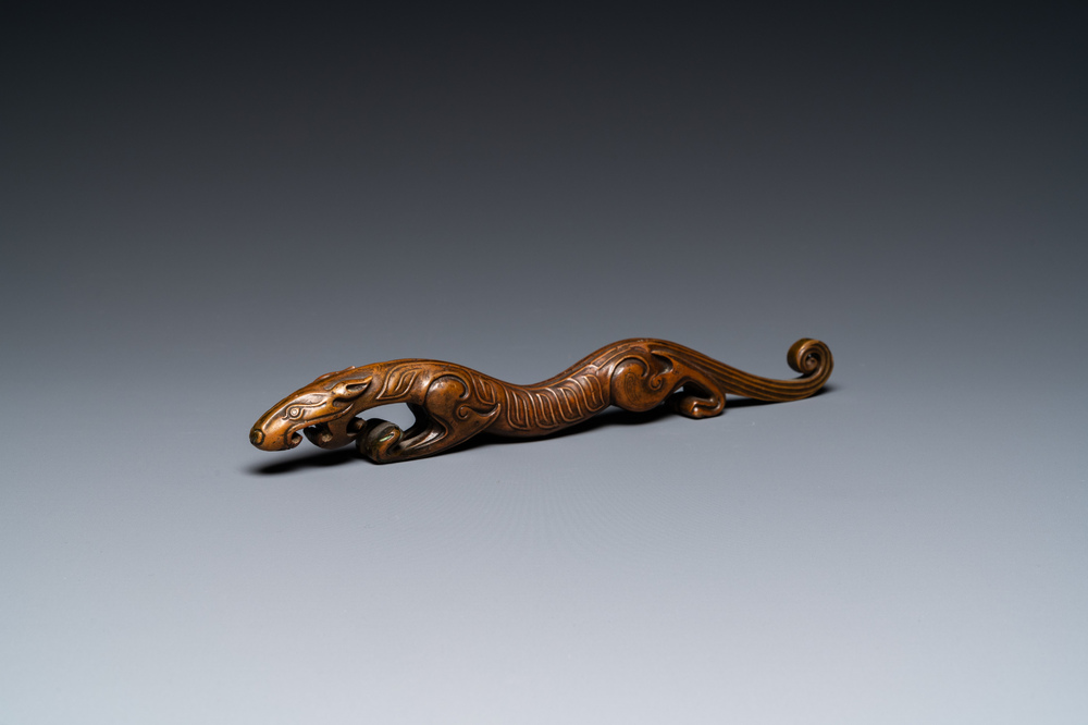 A Chinese bronze 'chilong' scroll weight, probably Qing