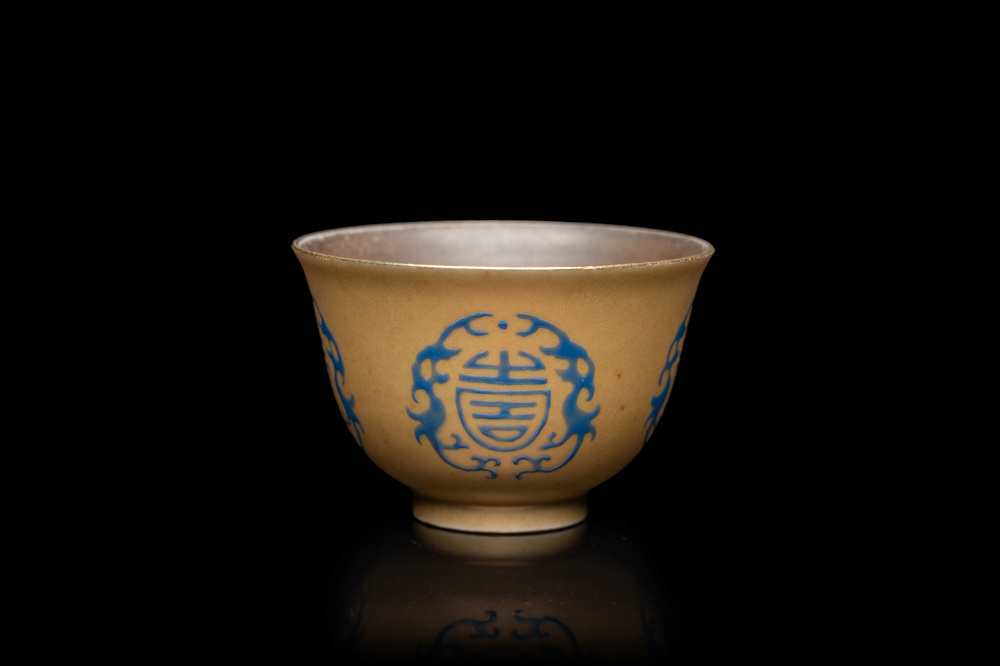 A Chinese blue enamel on gilt &lsquo;Shou&rsquo; tea bowl, 18/19th C.