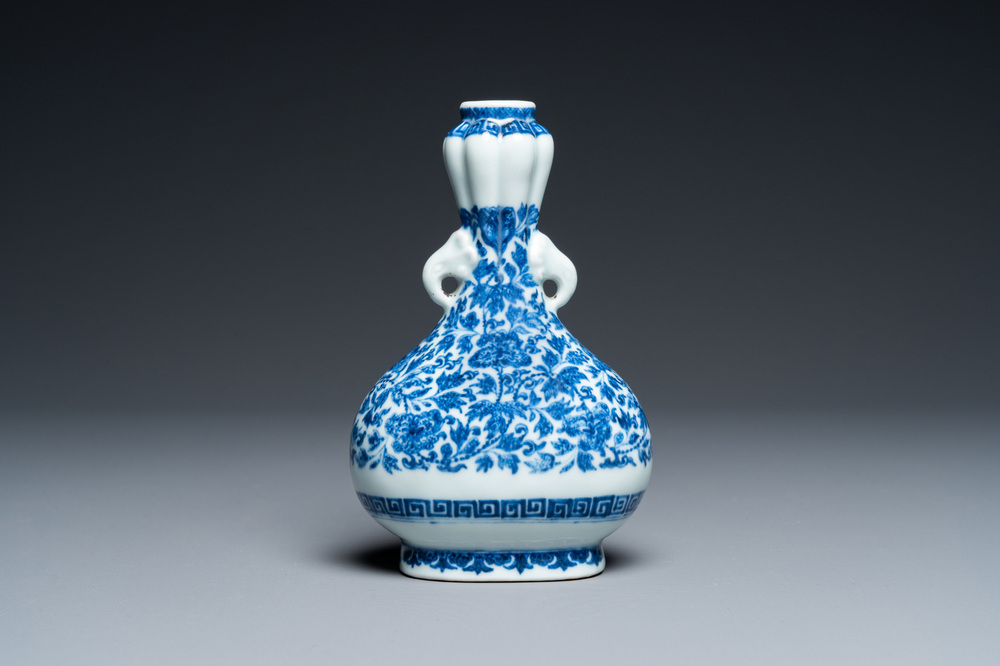 A Chinese blue and white Ming-style vase with floral design, probably Qianlong