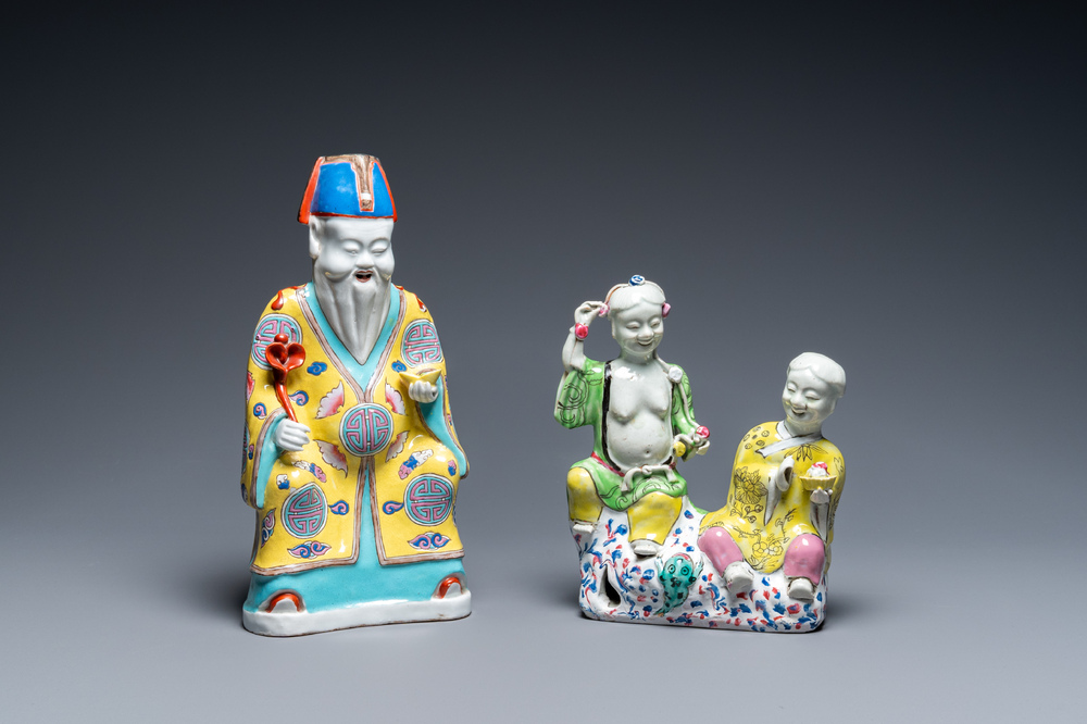 A Chinese famille rose 'Hehe Er Xian' group and a 'Caishen' figure, Qianlong and later