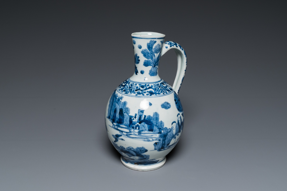 A Japanese blue and white jug with figures in a landscape, Edo, 17th C.