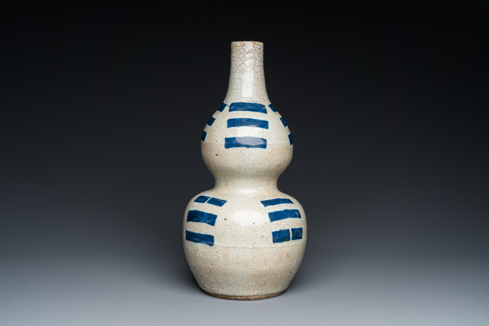 A Chinese blue and white crackle-glazed double gourd 'trigrams' vase, probably  Ming