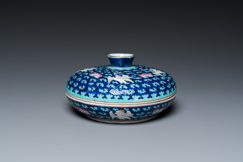 A Chinese famille rose blue-ground spice box and cover for the Straits or Peranakan market, 19th C.