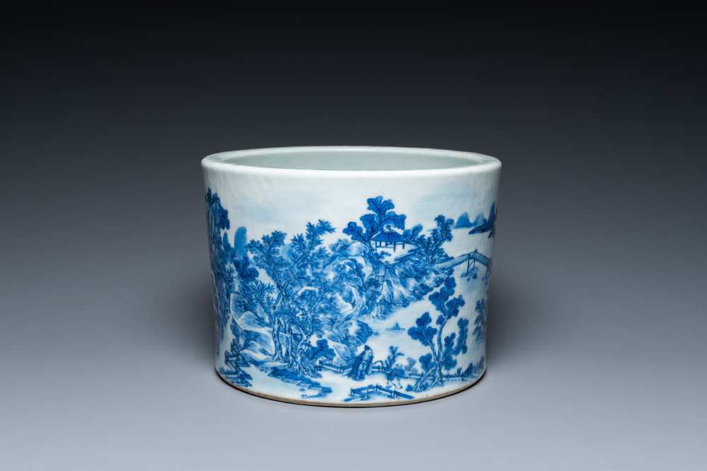 A Chinese blue and white brush pot with a refined landscape, 19th C.
