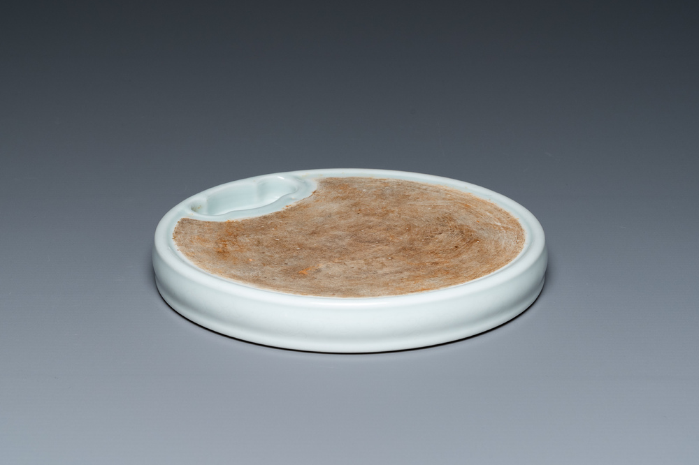 A Chinese white-glazed anhua-decorated ink stone, Qing