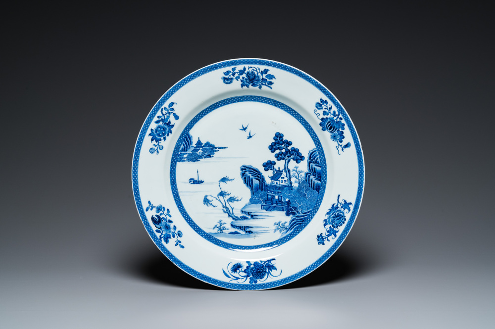 A large Chinese blue and white dish with a fine landscape, Qianlong