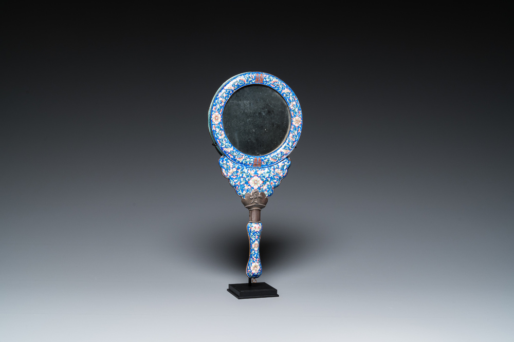A Chinese Canton enamel hand mirror, inscribed 'Dan Na', Qianlong