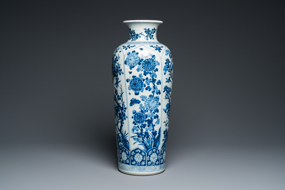 A large Chinese blue and white rouleau vase with floral design, Kangxi