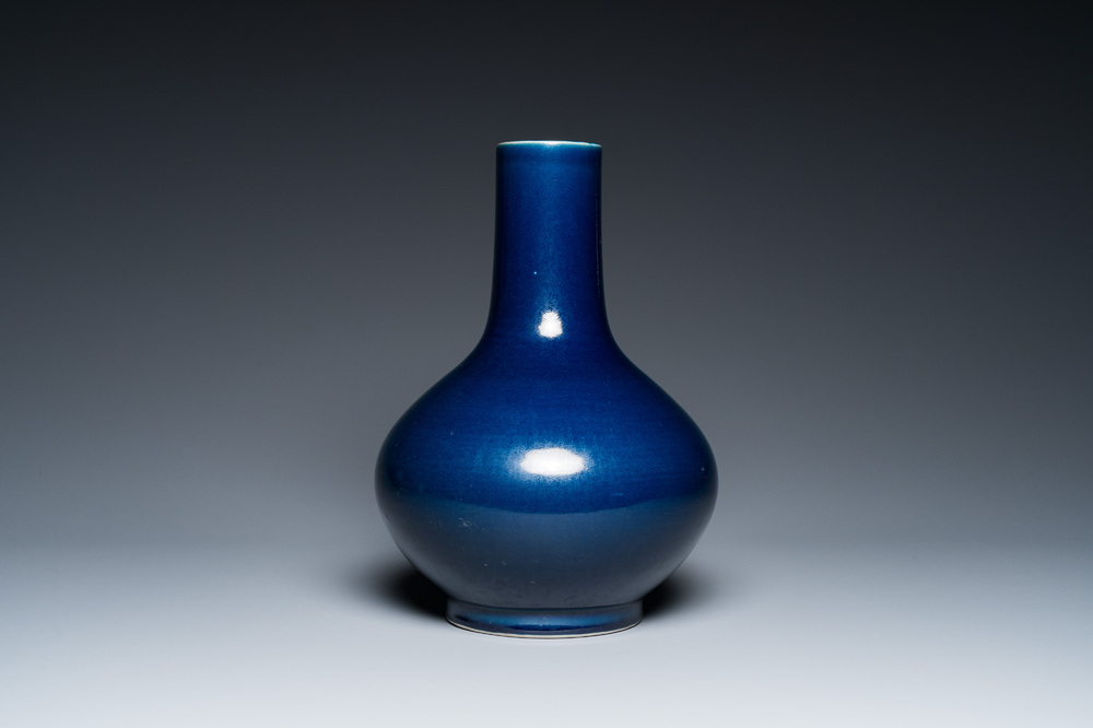 A Chinese monochrome 'sacrificial blue' bottle vase, 18/19th C.