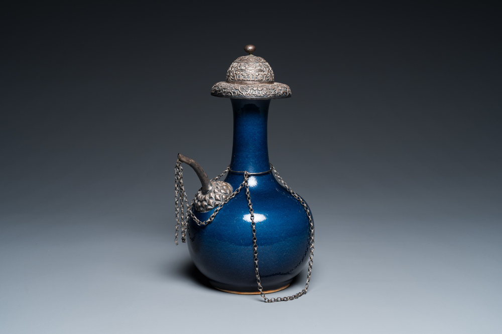 A Chinese monochrome blue-glazed kendi with silvered copper mounts, Qianlong