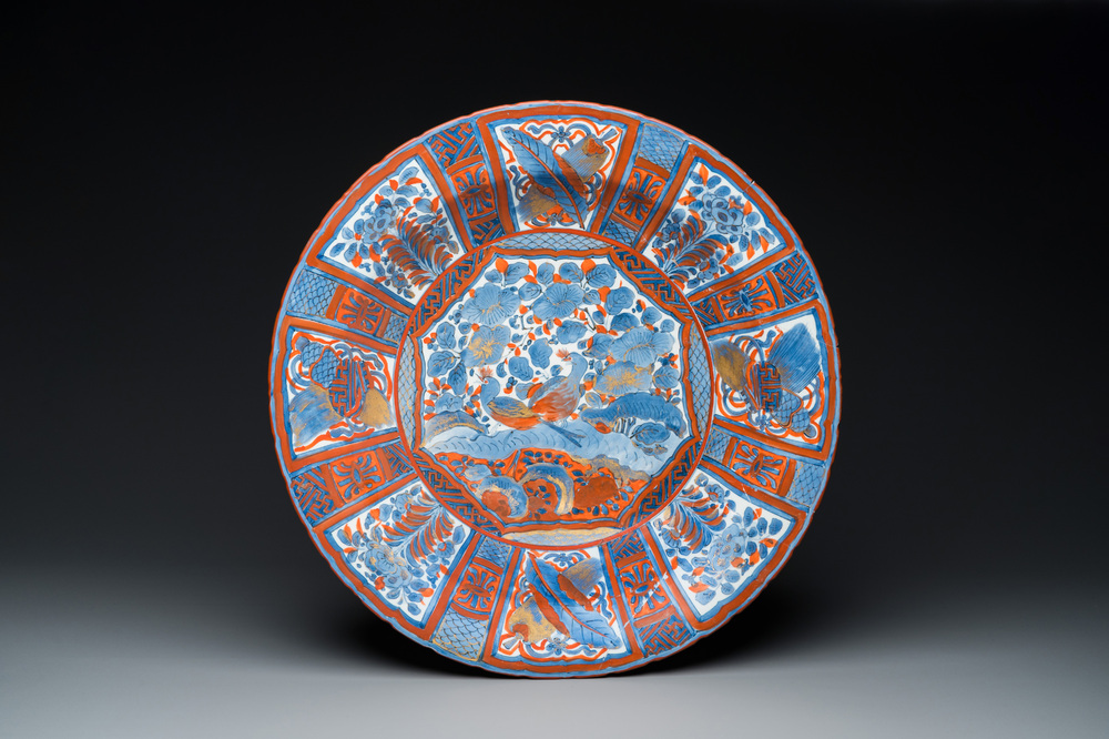 A large Japanese iron-red-decorated blue and white Arita Kraak-style dish, Edo, 17th C.