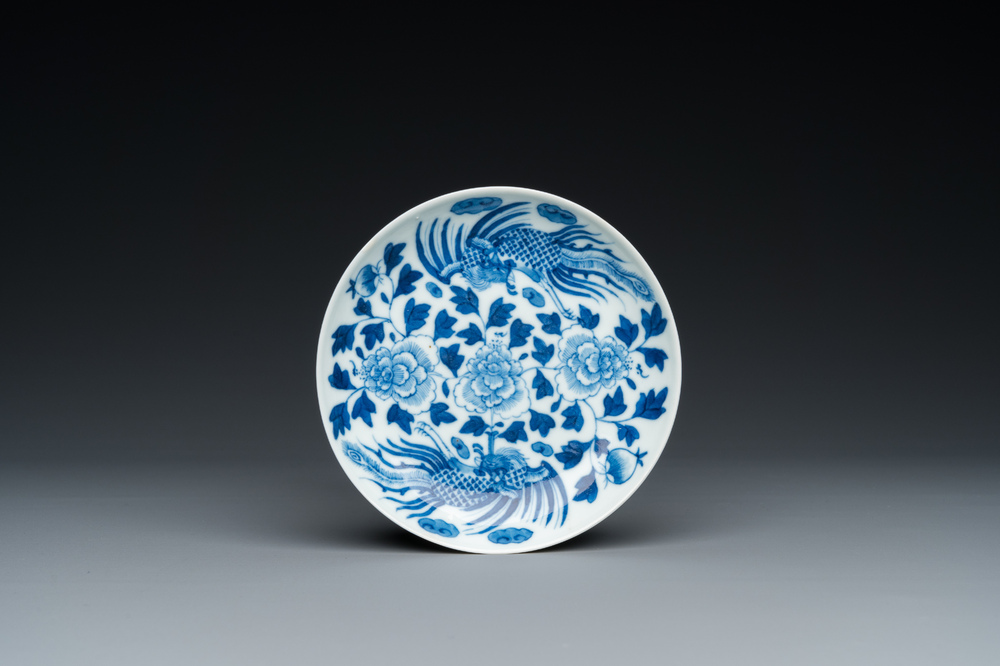 A Chinese blue and white 'Bleu de Hue' dish with phoenixes for Đặng Huy Trứ (1825 - 1874), Đặng Huy Trứ mark and inscription, dated 1868