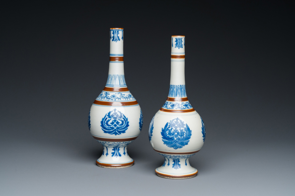 A pair of Chinese blue and white 'Baoxiang' sprinklers, Kangxi
