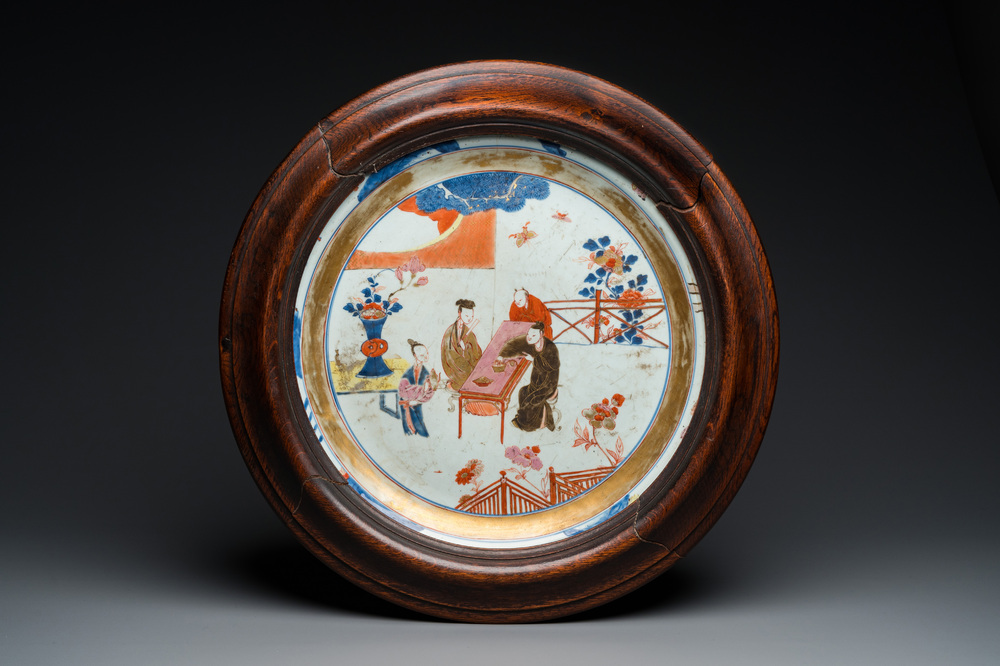 A large Chinese rose-Imari 'tea drinkers' dish, Yongzheng