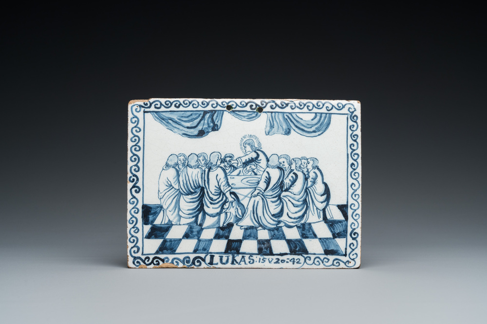 A rectangular Dutch Delft blue and white 'Last Supper' plaque, probably Amsterdam, 18th C.