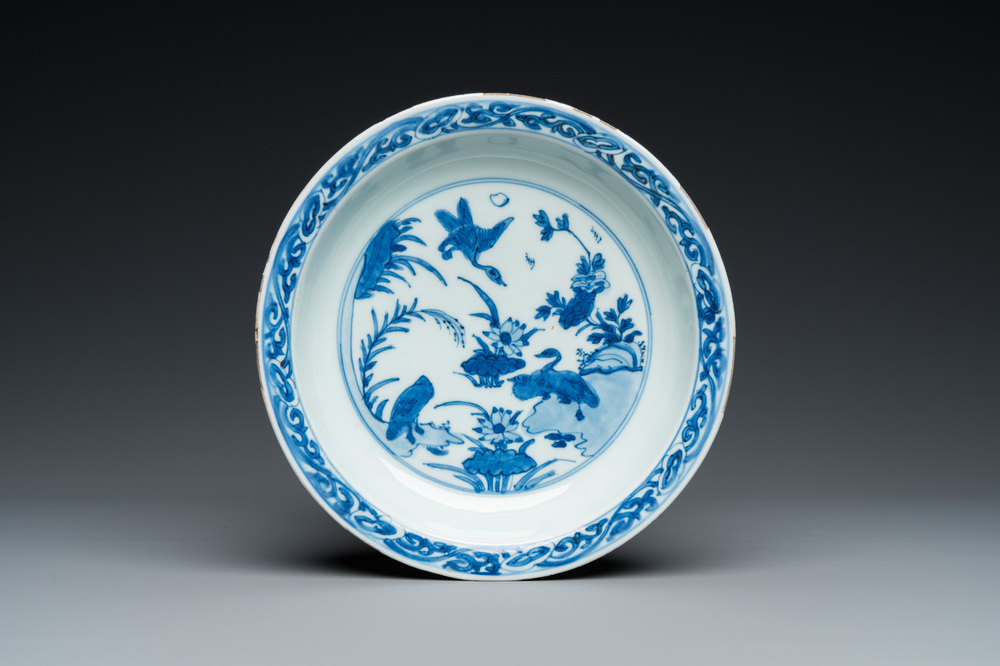 A Chinese blue and white 'ducks near a lotus pond' plate, Wanli