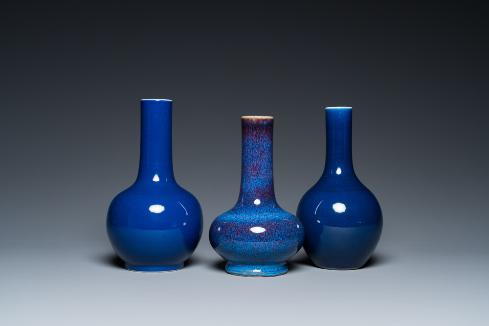 Three Chinese monochrome blue- and flamb&eacute;-glazed bottle vases, 19/20th C