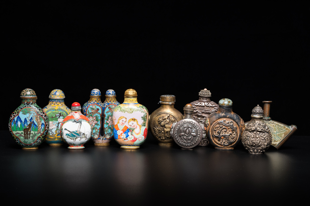 Eleven Chinese Canton enamel, cloisonn&eacute;, silver and other metal snuff bottles, 19/20th C.