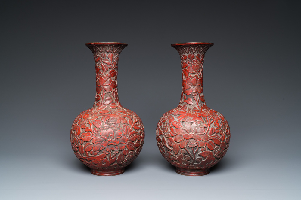 A pair of Chinese red cinnabar lacquer bottle vases, 19/20th C.