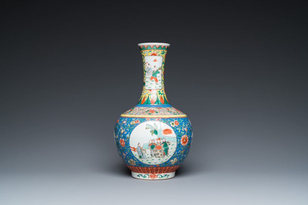 A Chinese famille verte bottle vase, Kangxi mark, 19/20th C.