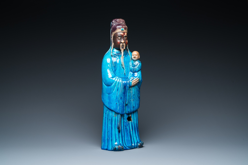 A large Chinese partly lacquered turquoise-glazed figure of the star god 'Fuxing', 18/19th C.