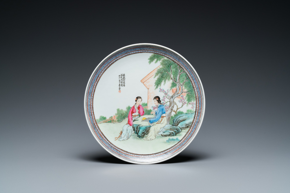 A Chinese famille rose dish with ladies playing go, signed Wanglong Fu 王隆夫, dated 1954