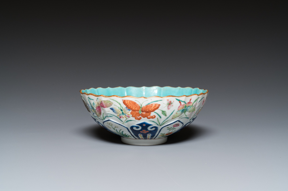 A Chinese famille rose 'butterflies' bowl, Jiaqing mark, 19th C.