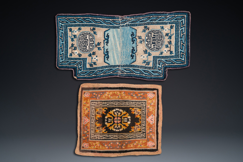 Two Chinese or Tibetan saddleback rugs, 19th C.