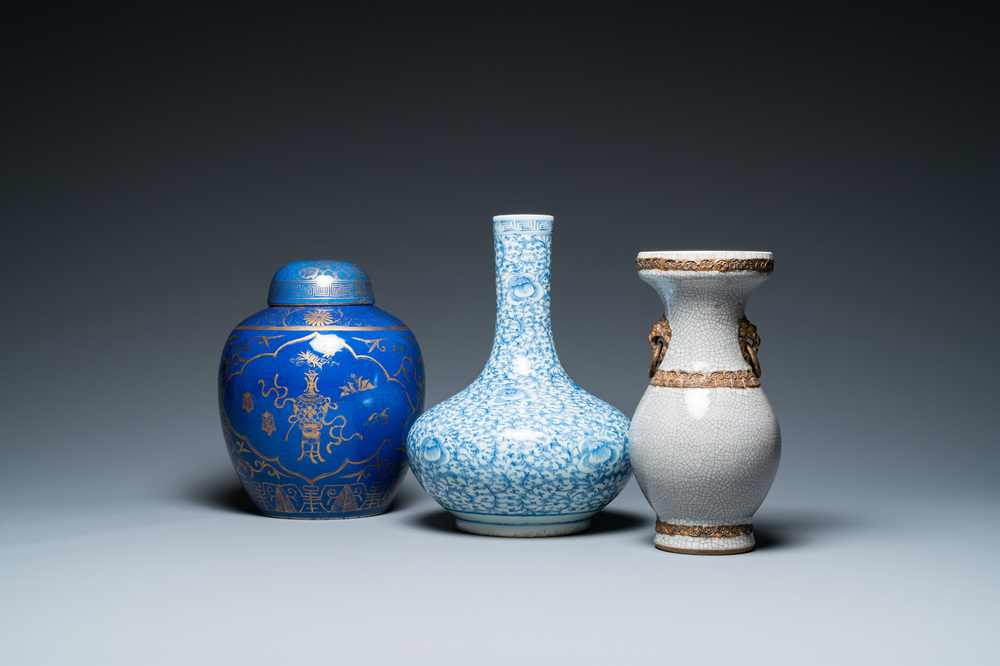 Three Chinese blue and white, crackle-glazed and powder-blue vases, 19th C.