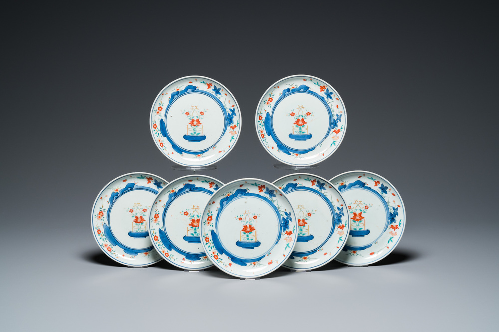 Seven Japanese Kakiemon-style plates with flower baskets, Chenghua mark, Edo, 17/18th C.