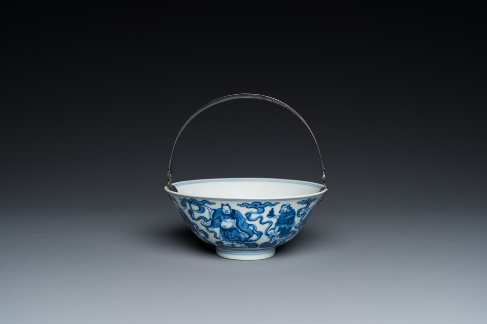 A Chinese blue and white 'eight immortals' bowl with silver handle, Qianlong mark and of the period