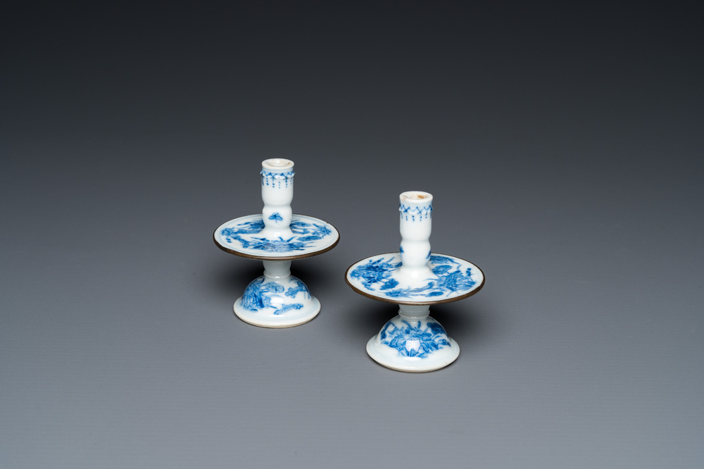 A pair of Chinese blue and white 'Bleu de Hue' candlesticks for the Vietnamese market, Kim Ngoc Cam Kee 金玉錦記 mark, 19th C.