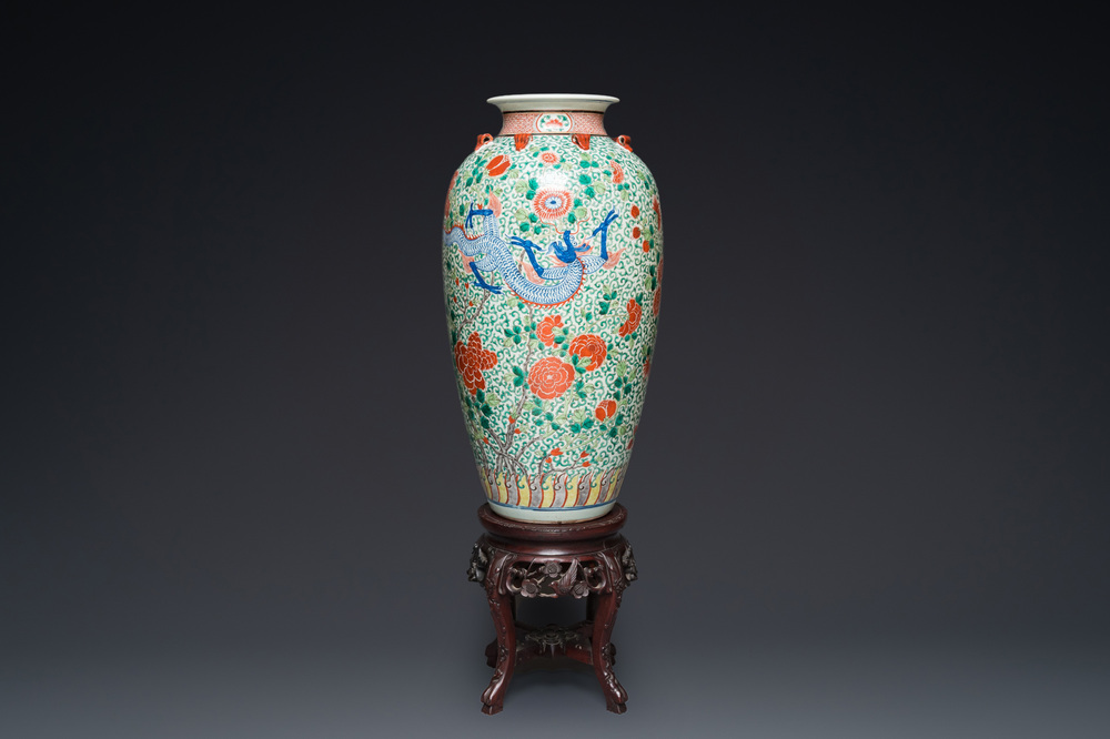 A very large Chinese famille verte 'dragon' vase on wooden stand, 19th C.