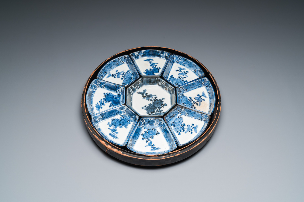 A Japanese blue and white Arita nine-piece sweetmeat set in its original lacquer box, Edo, 17/18th C.