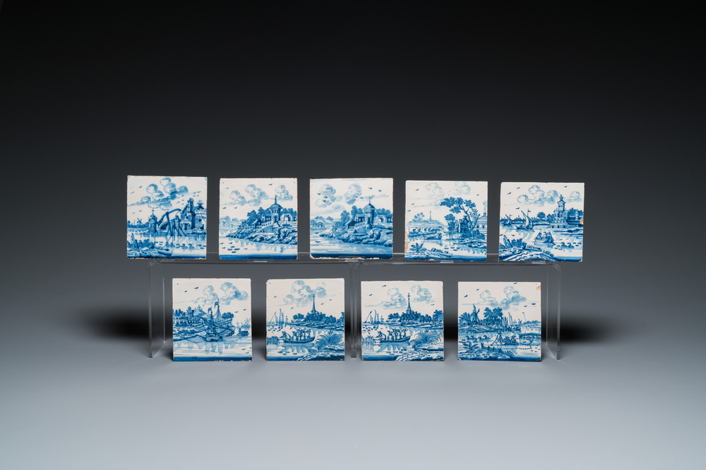 Nine blue and white Dutch Delft tiles with continuous landscape scenes, 18th C.