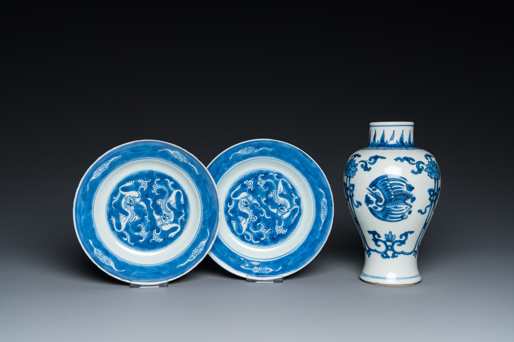 A Chinese blue and white 'cranes' vase and a pair of plates, Kangxi