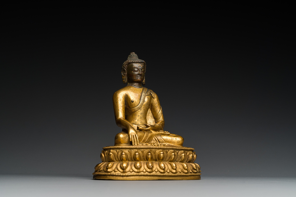 A Sino-Tibetan gilt bronze Buddha, 18th C.
