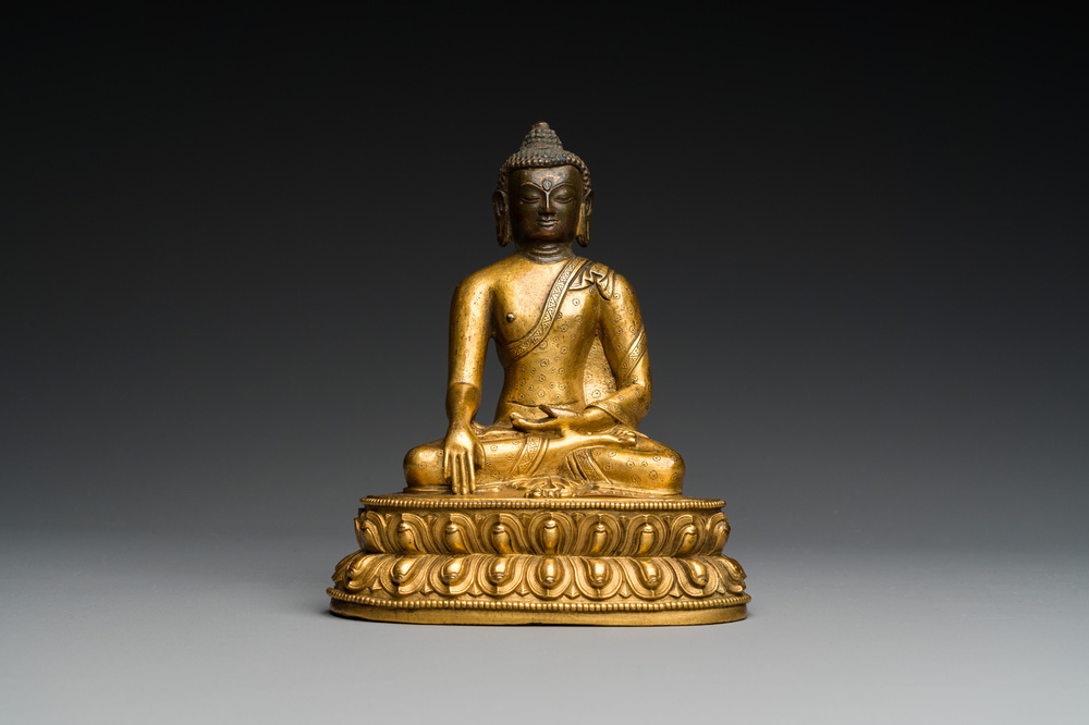 A Sino-Tibetan gilt bronze Buddha, 18th C.