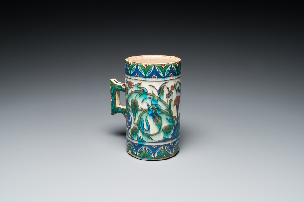 A polychrome Iznik-style mug, Kutahya, Turkey, 19th C.